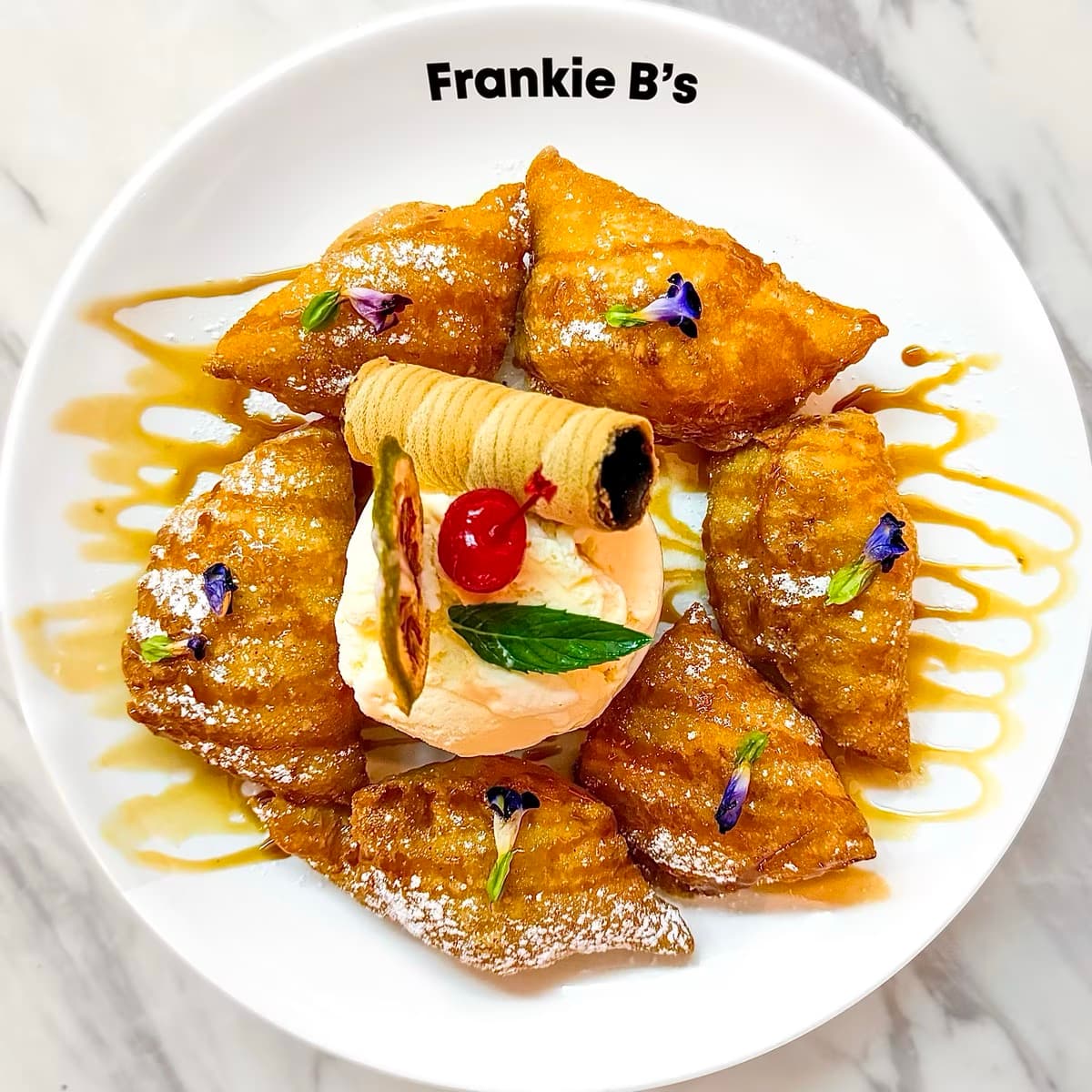 Brulee Custard Pockets at Frankie B's Food House – Pastry pockets filled with vanilla brulee custard and mascarpone cream